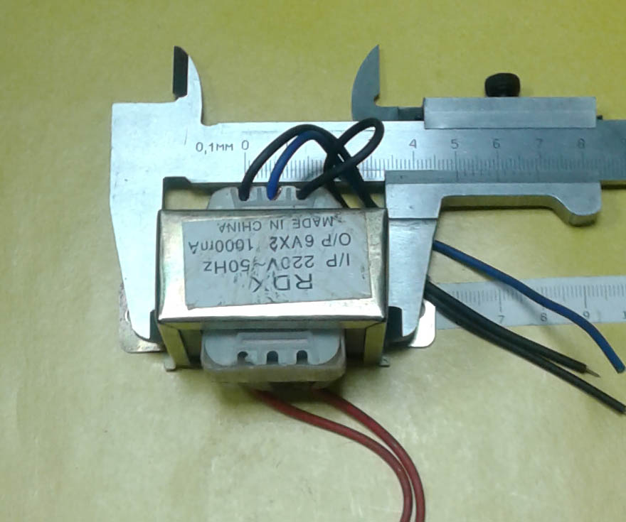 Трансформатор 1000mA 6В  51x27x42 мм